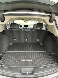Clean SUV cargo area with mats in place