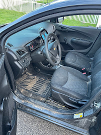 Driver's side interior cleaned including mats and door panel