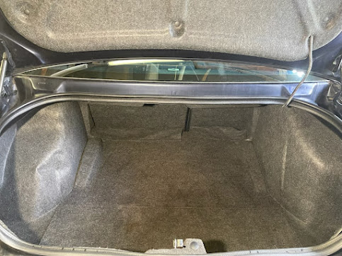 Freshly vacuumed and cleaned car trunk